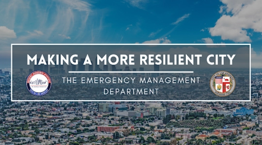 Screen slide with a landscape and clouds; words in front say MAKING A MORE RESILIENT CITY /  The Emergency Management Department