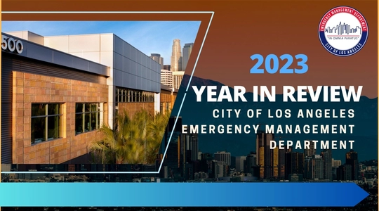 A photo of the LA City Emergency Operations Center with a backdrop of the LA City Skyline; TEXT: 2023 Year in Review / City of Los Angeles Emergency Management Department