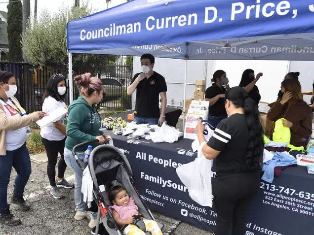 Councilman Curren D Price, Jr assistant tent for 27th Street