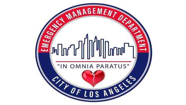 The red, white and blue logo of EMD, with a broken heart image added below the City Skyline. 