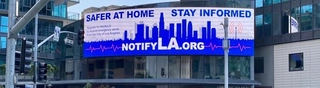 A billboard invites passersby to sign up for NotifyLA